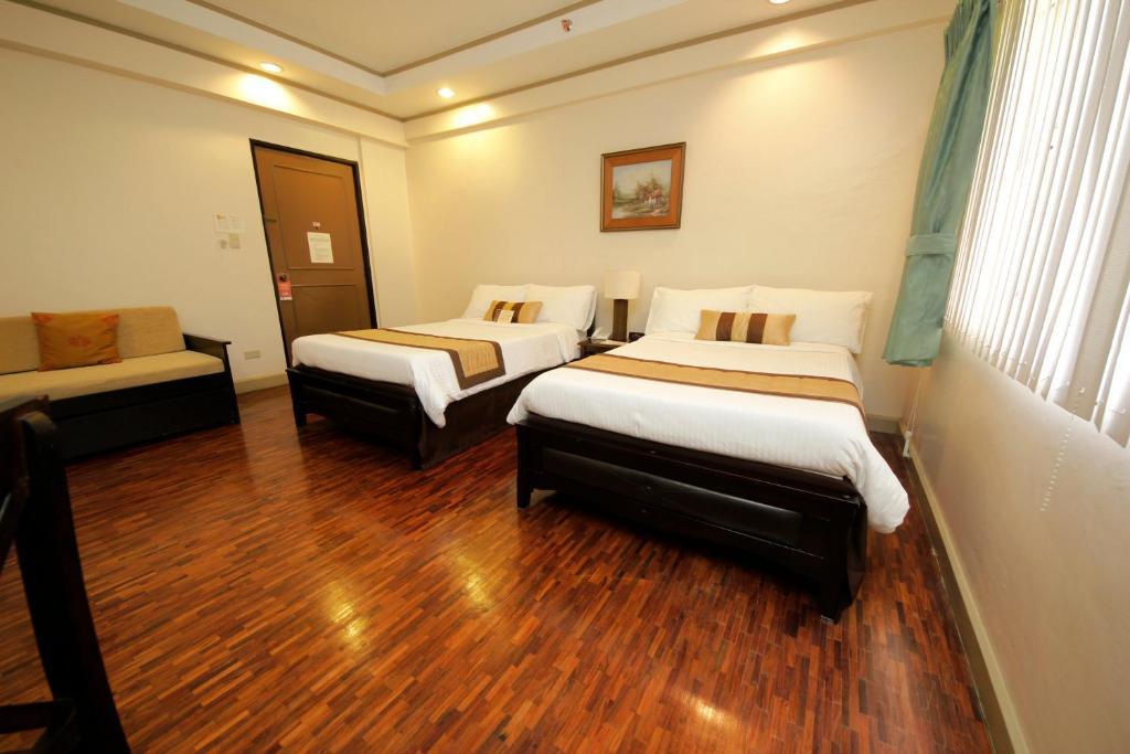 Casa Pura Inn And Suites Manila Room photo